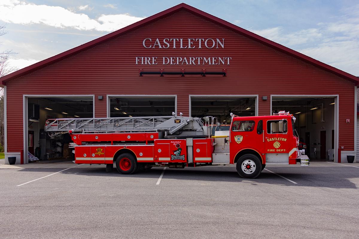 Castleton Fire Department Ladder Truck in front of station